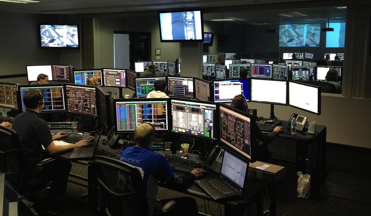 Engineers monitoring DNS and registry publication infrastructure